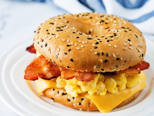 Bagel egg cheese bacon breakfast sandwich